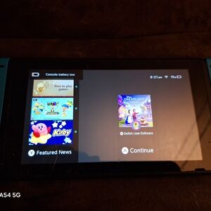 Nintendo Switch with Blue and Black Joy-Con